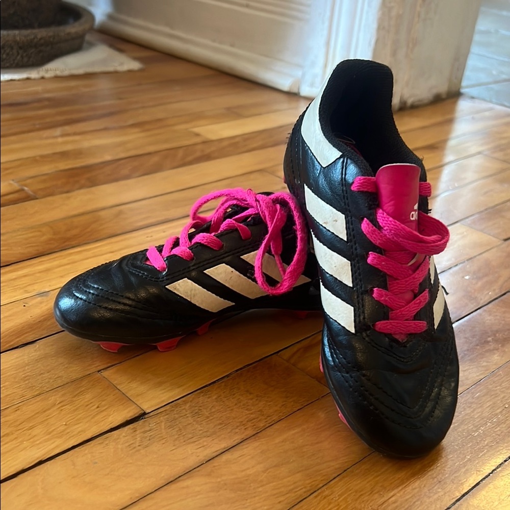 adidas Black Soccer Cleats with White Stripes and Pink Laces